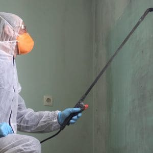 men getting sample from building for asbestos test